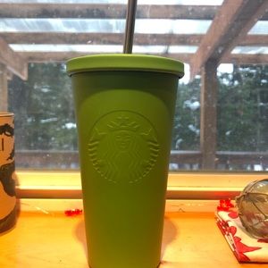 Starbucks coffee cup with metal straw